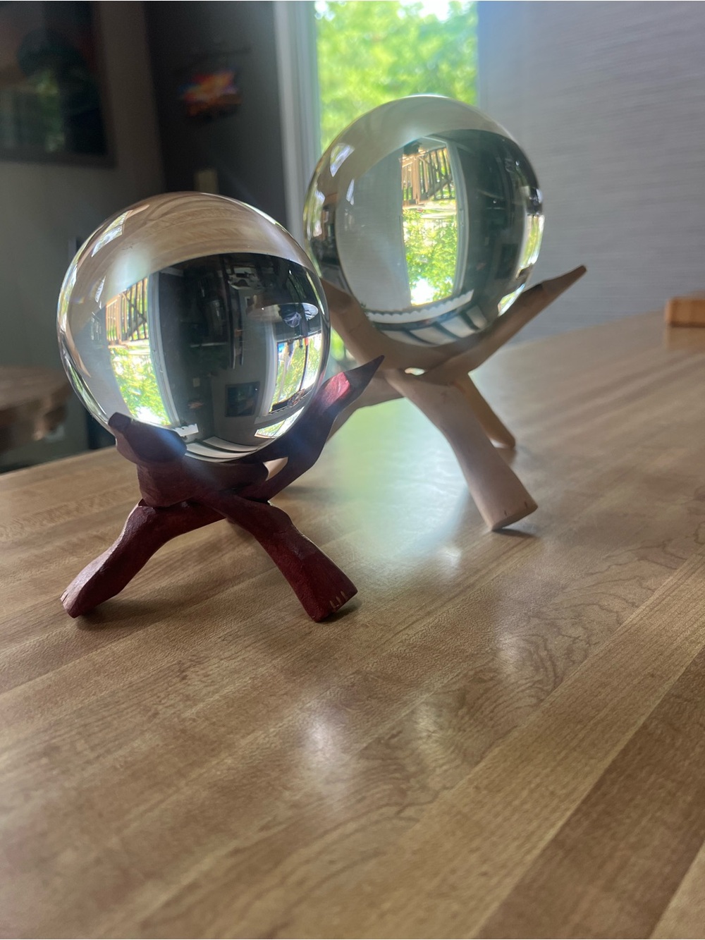 2 clear quartz crystal balls with stands